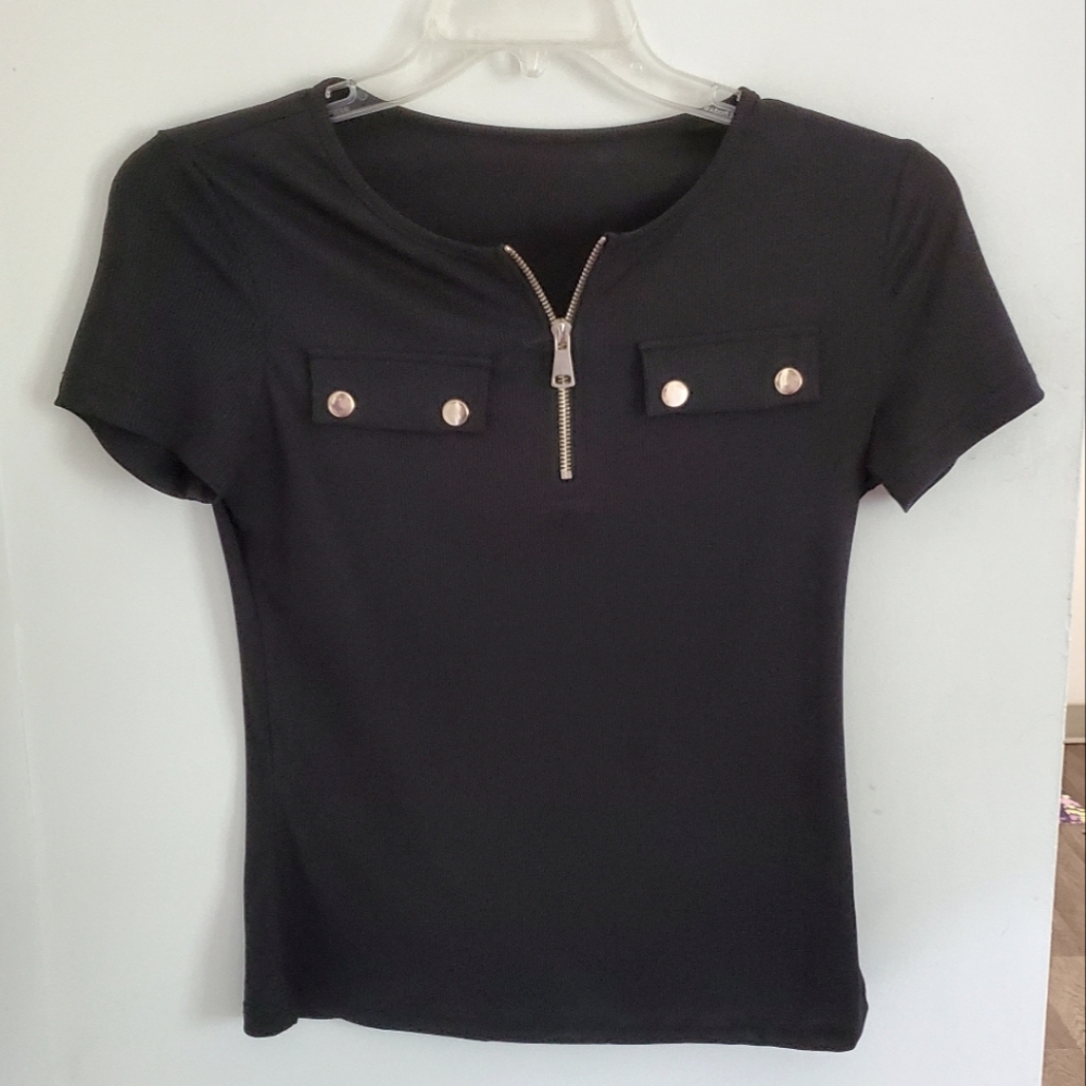 Black zippered blouse.
